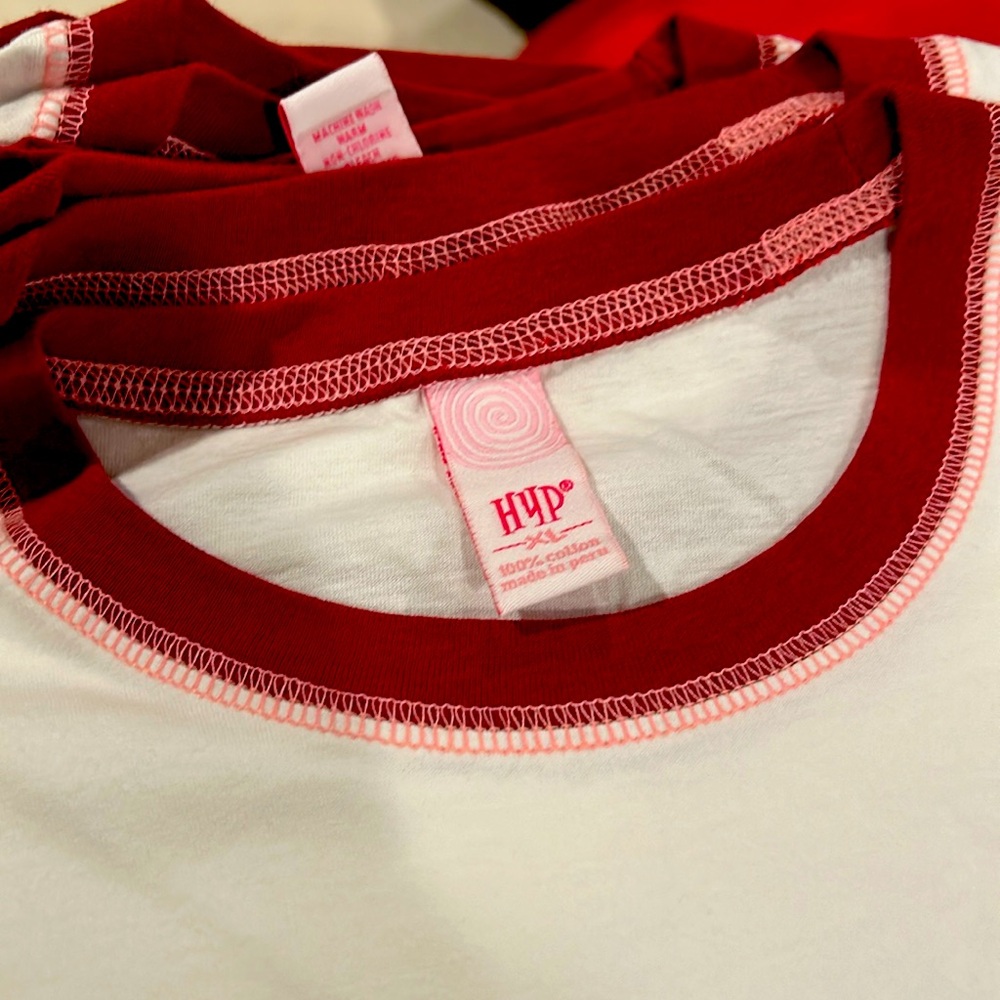 12. Absolutely brand new 100% cotton pre-washed HNP girls tricolored T-shirt.